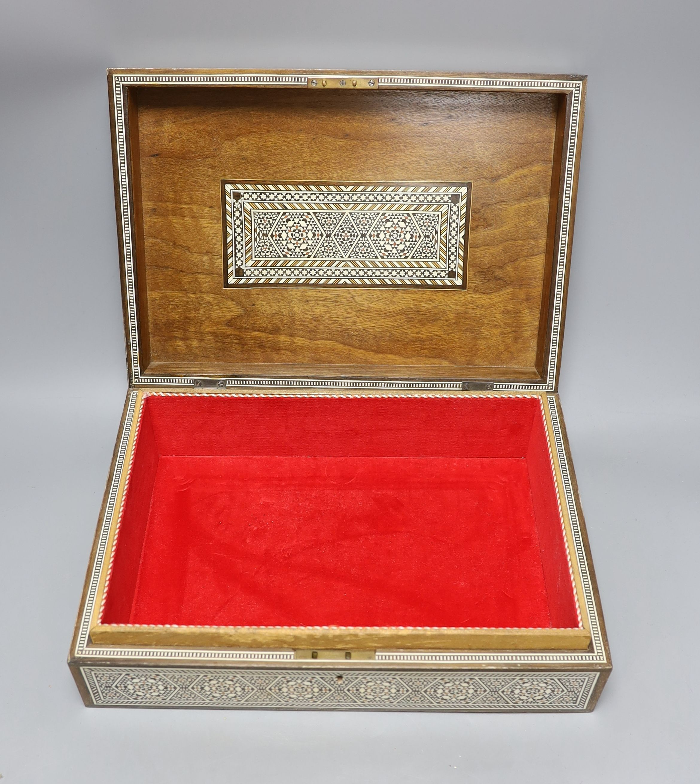 A Damascus jewellery casket and a pair of Victorian candlesticks, 43cm tall